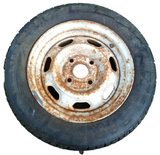 1973–81 Toyota Celica Corolla 14x5.5 OE Steel Wheel Rim With Studded Winter Tire