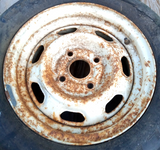 1973–81 Toyota Celica Corolla 14x5.5 OE Steel Wheel Rim With Studded Winter Tire