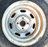 1973–81 Toyota Celica Corolla 14x5.5 OE Steel Wheel Rim With Studded Winter Tire